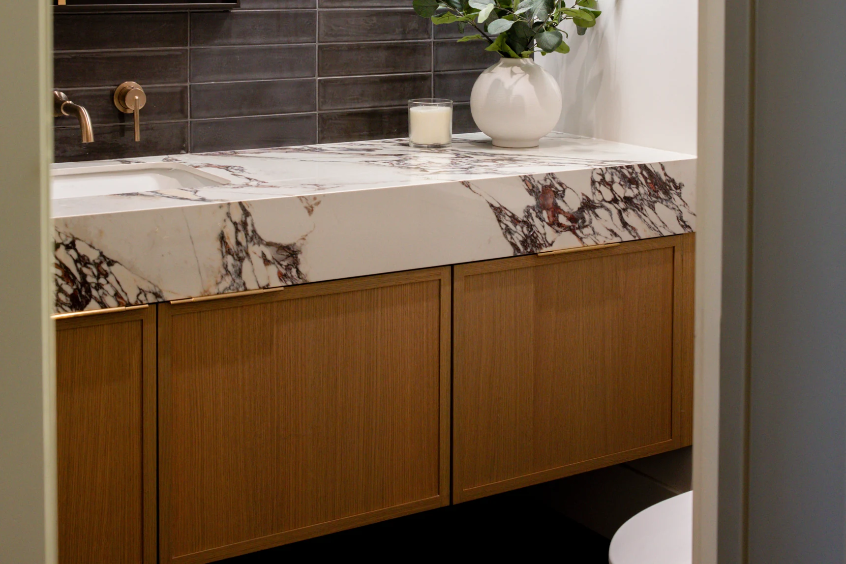 Crystal powder room vanity designed by Artistic Kitchen