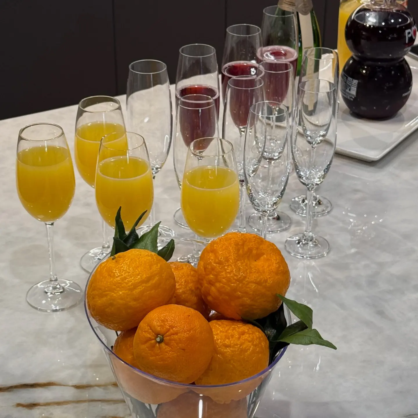 Drinks and oranges on a counter at the Ogawa Fisher trade event