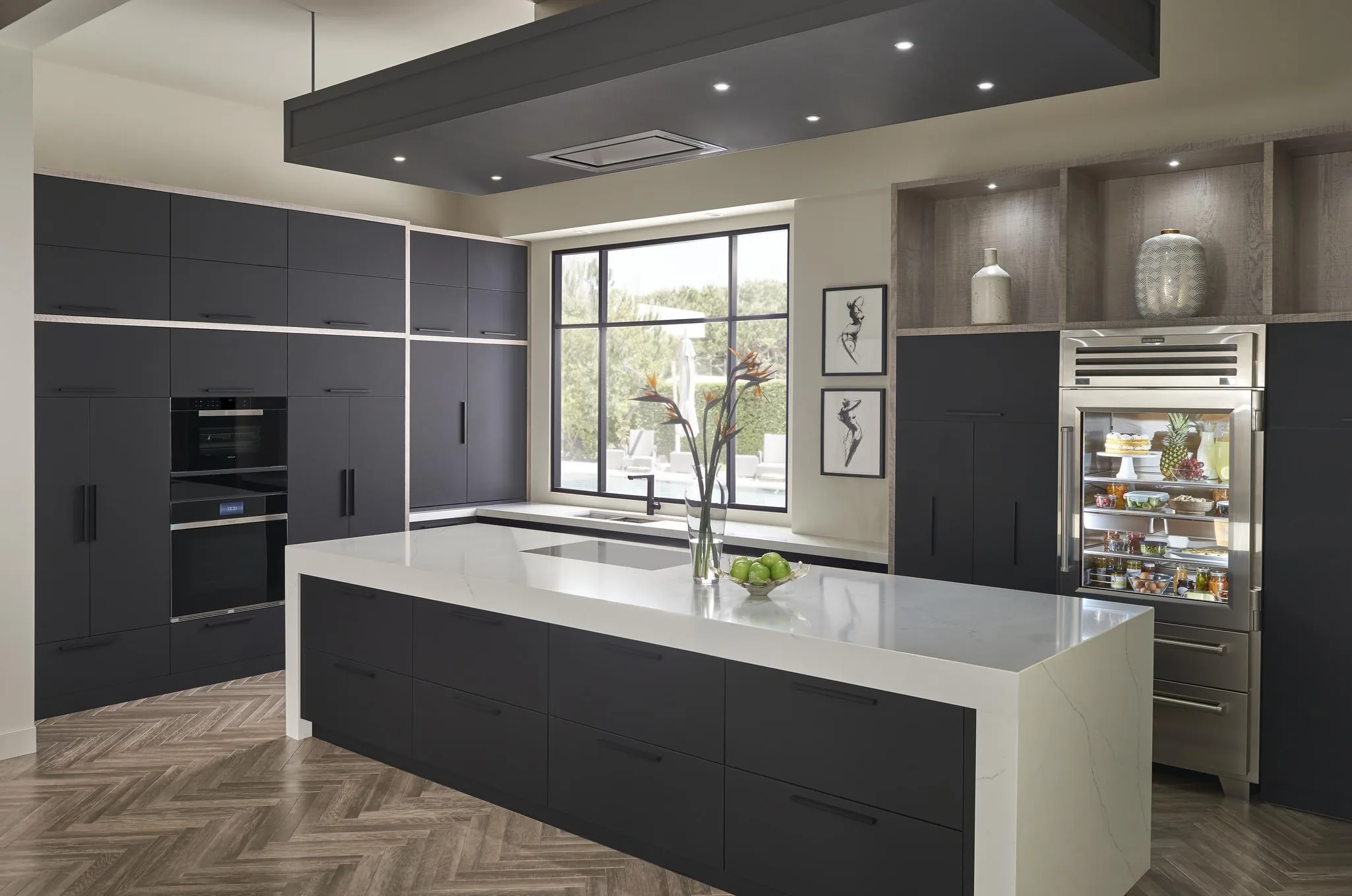 Modern Wood-Mode kitchen with matte black cabinets and a white island
